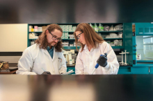 Caleb Bailey and McKenna Green working together in the lab.