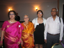 Challa is pictured with her mother at her 2013 psychiatry residency graduation from Michigan State University, along with her grandparents, whose support has been an integral part of her journey.