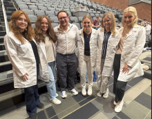New UK trainees show off their new long white coats