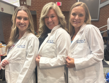 New UK trainees show off their new long white coats