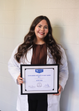 Land earned the 2025 "Outstanding Graduate Student Award" during the college's annual award convocation.