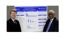 Justin Hudnall and Dr. Sibu Saha at the research poster presentation