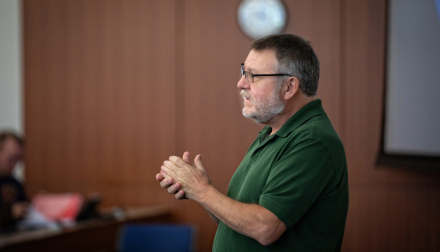 a Photo of Dr. Jim Pauly giving a lecture 
