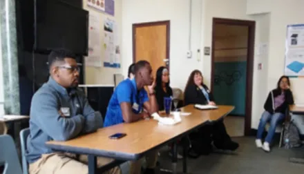 Teachers learning at a table