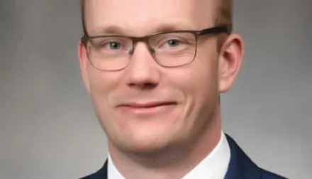 Garrett Oberst smiling for his headshot