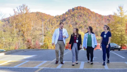 UK medical students walking down the street on UKCOM Morehead campus