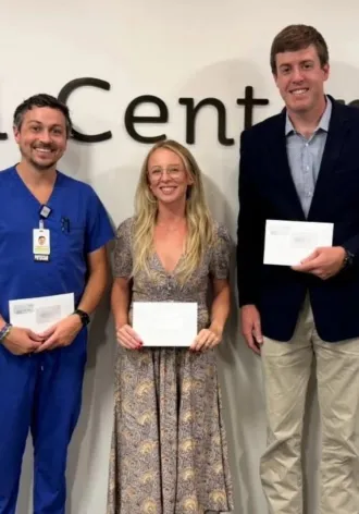 (From left to right): Dr. Darrin Laswell, Dr. Dixi Secula, and Dr. Ethan Smith