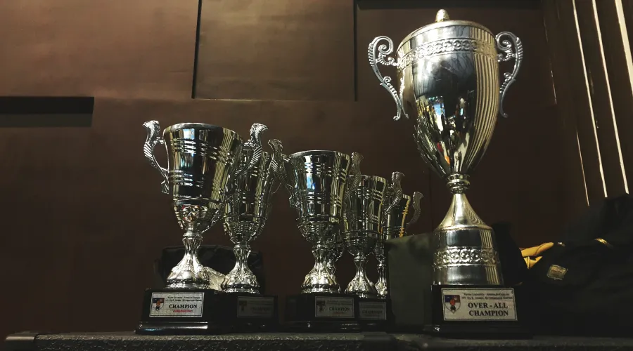 trophies on a table; no inscriptions