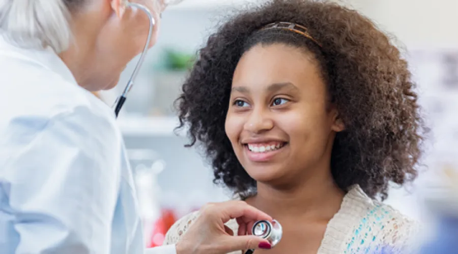 Adolescent child at a check-up.
