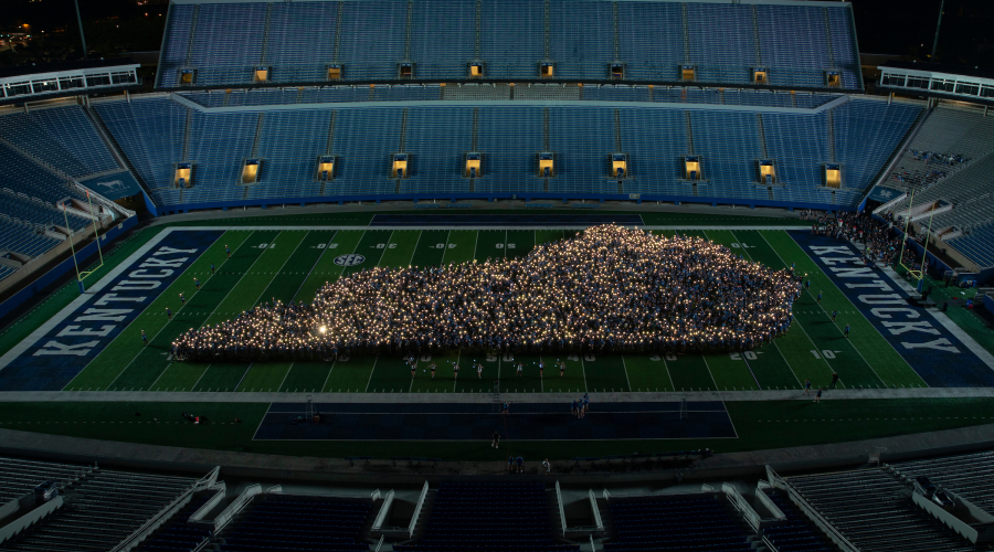 UK students standing in the shape of the state of Kentucky on Kroger Field