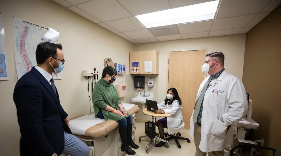 group of providers in an examination room