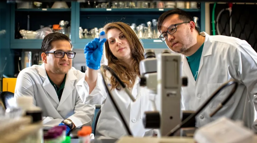 student researchers in a lab together