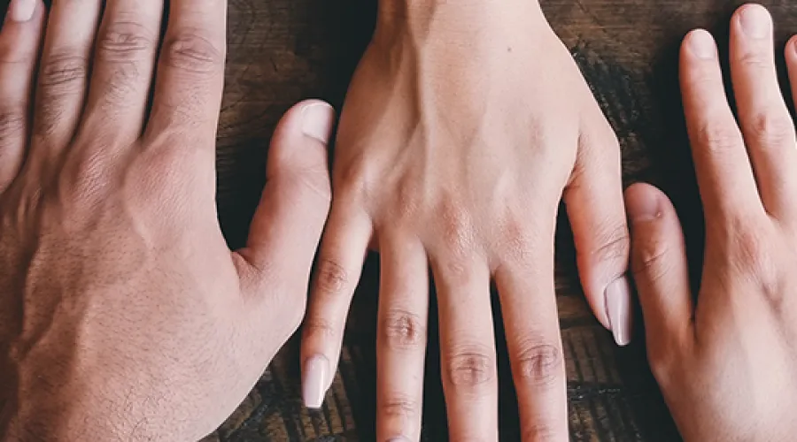 hands from many different races at one table.