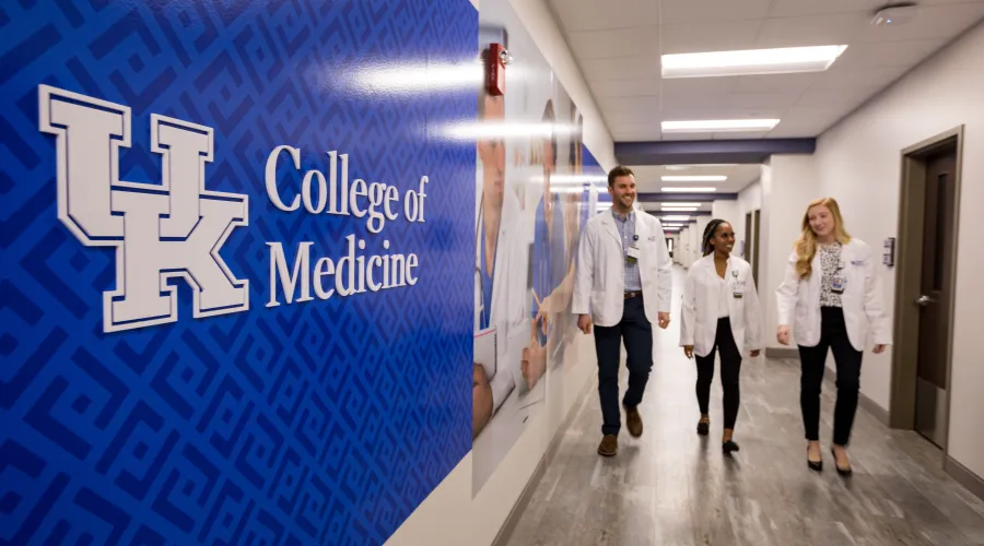 students walking down a hallway