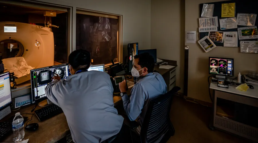doctors looking at scans