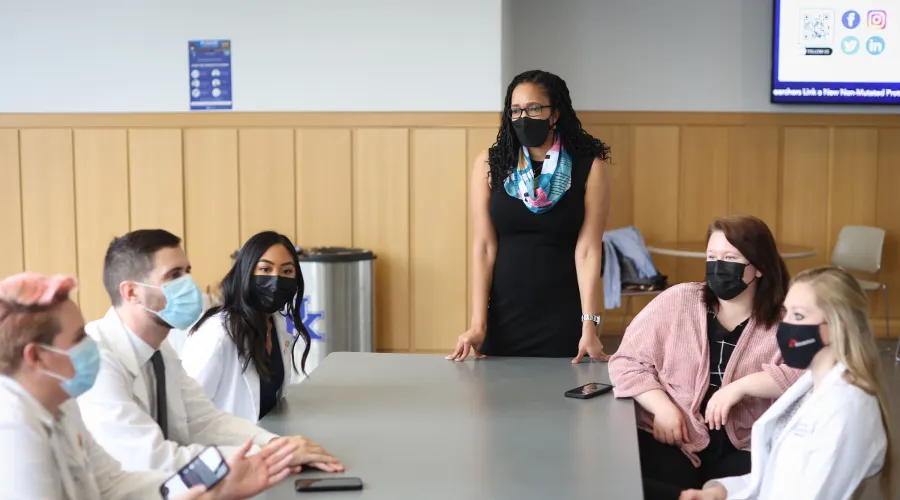 associate dean for diversity dr. white with staff and medical students