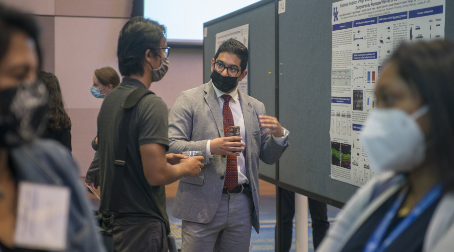 People talking at Cardiovascular Research Day