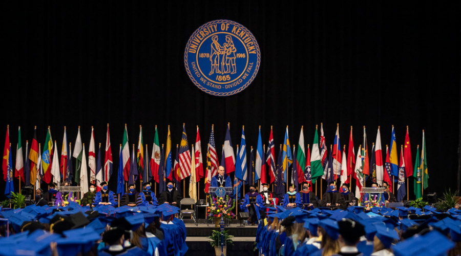 UK graduation with flags on stage