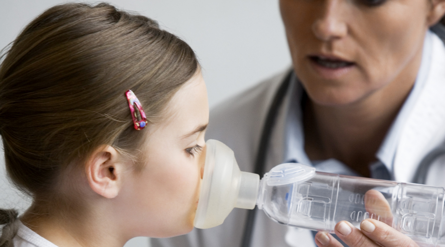 child administered breathing treatment by provider