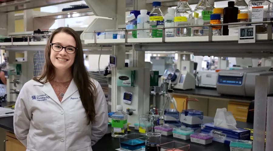 UK doctor standing in lab