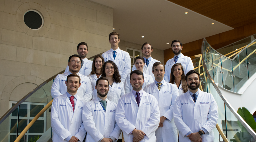 A group picture of everyone in urology on the stairs of Chandler hospital.