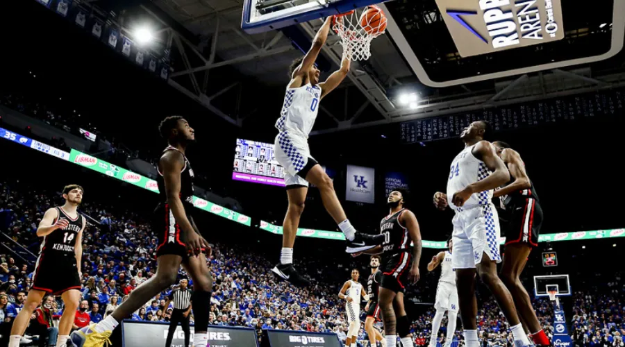 UK home basketball against Western KY University; basketball action in Rupp Arena with UK player dunking basketball