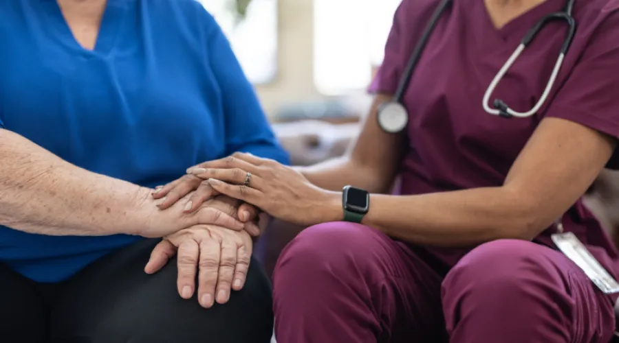 doctor comforting a patient