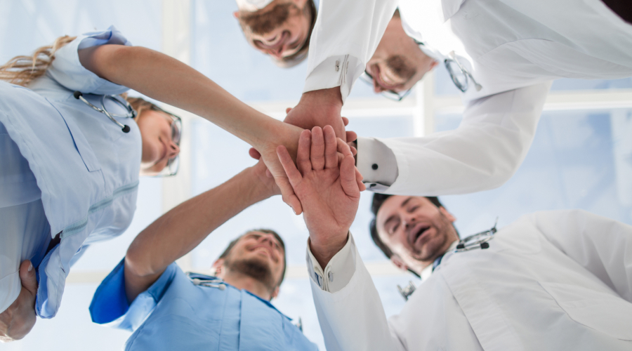 stock photo of medical staff in a huddle