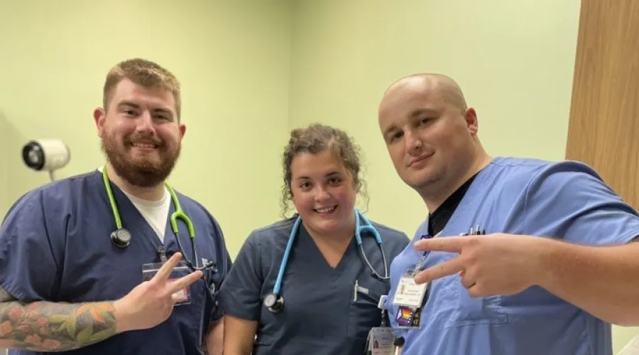 students posing in the clinic