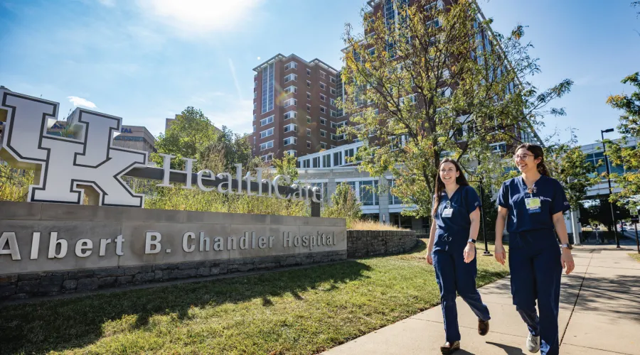 two medical students walking outside the hospital