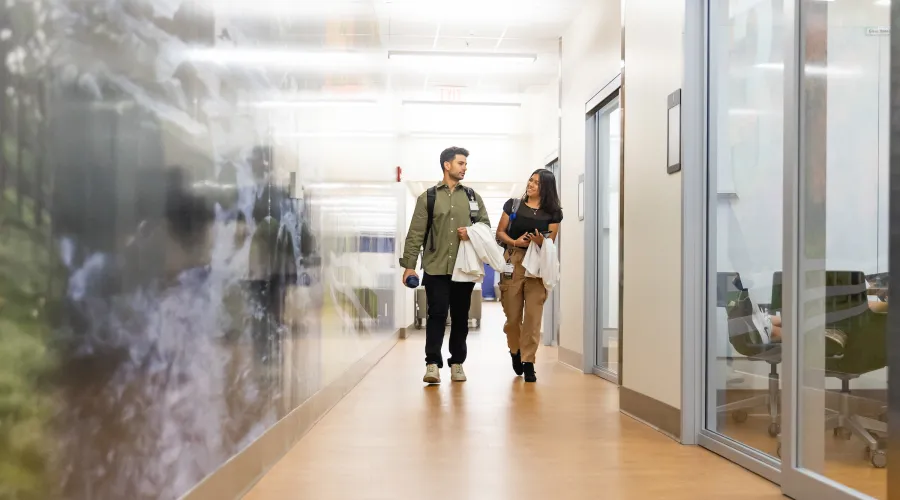 two medical students walking together