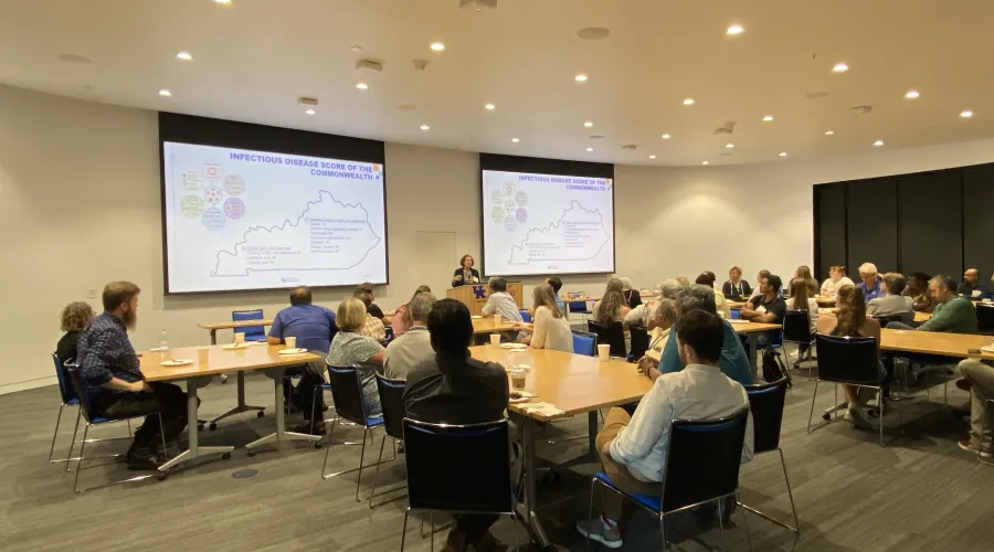 Dr. Messaoudi giving a presentation at CURE KY Open House