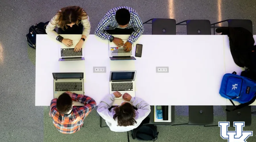Students at a table on their computers