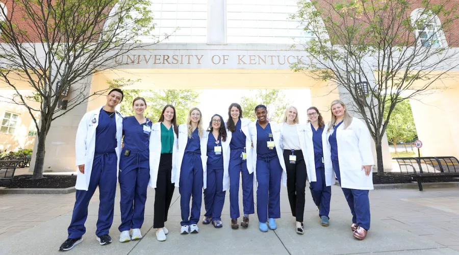 a group of residents at uk college of medicine stand together
