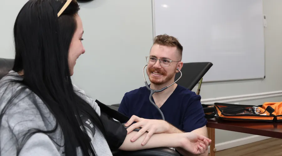 a university of kentucky medical student treating a patient