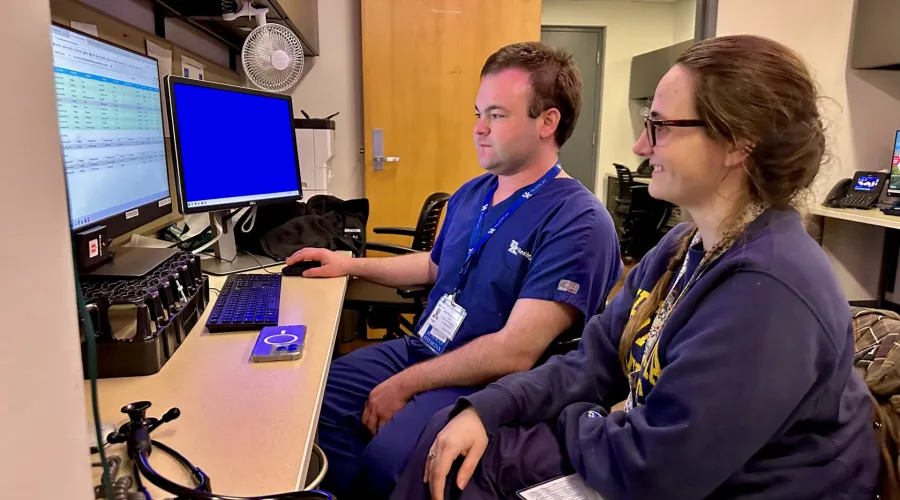 Residents sitting at a computer