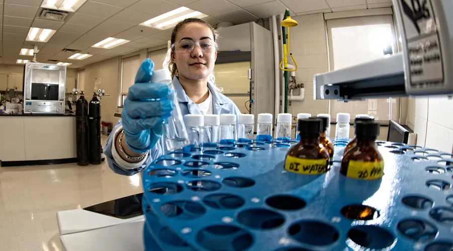 Young female scientist in research lab