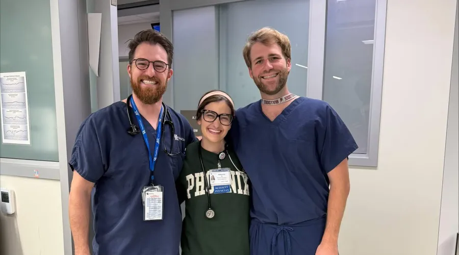 Three Internal Medicine Residents smile together