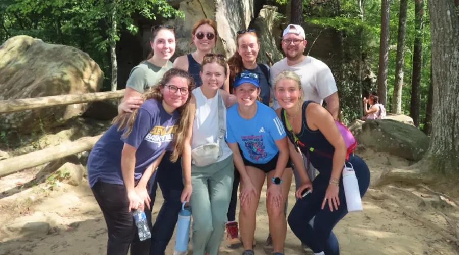 2026 Med-Ped Residents on a hike together at Natural Bridge.