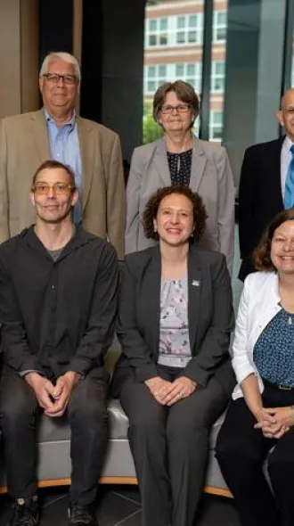 Consortium members sitting together.