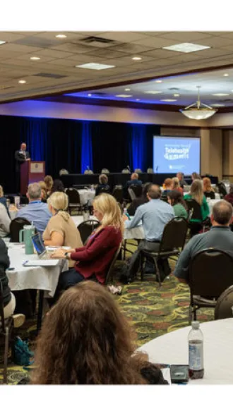 Conference room filled with participants of the Kentucky Rural Telehealth Summit 