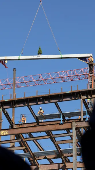 The raising of the signed beam at the Rankin Health Education Building on August 28, 2025.