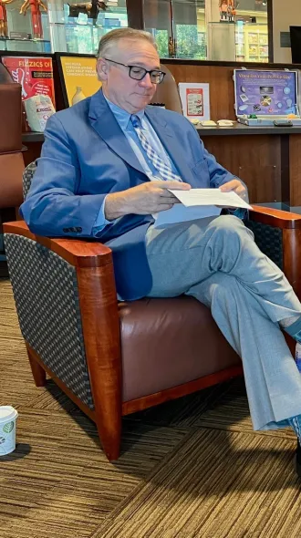 Stephen Strup, MD, and J. William Roberts meeting to discuss new endowment in library setting 
