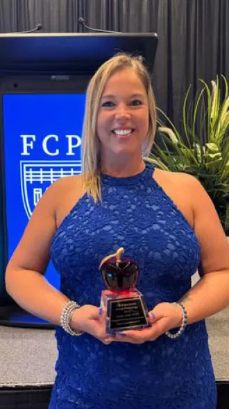 Photo of Megan Chestnut with award