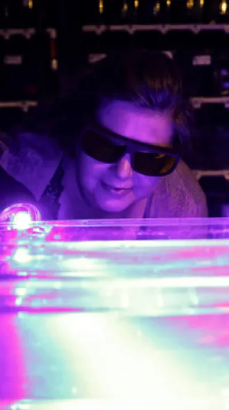 Photo of Scientist looking at Zebrafish