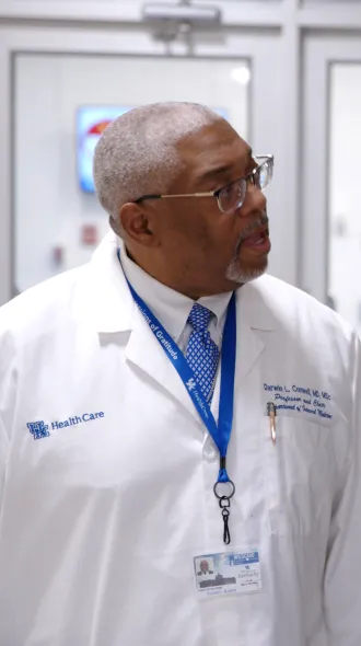 Darwin Conwell walks and talks with Dean Chipper Griffith