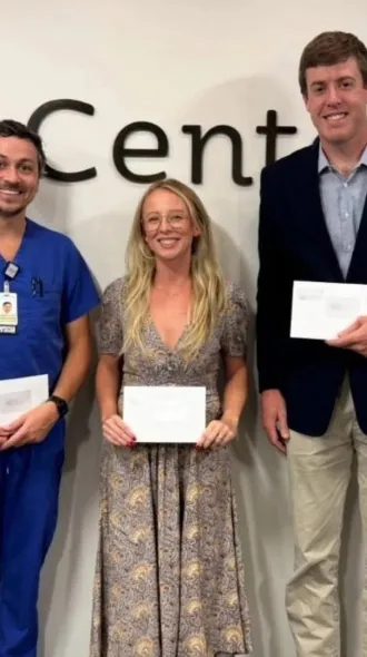 (From left to right): Dr. Darrin Laswell, Dr. Dixi Secula, and Dr. Ethan Smith